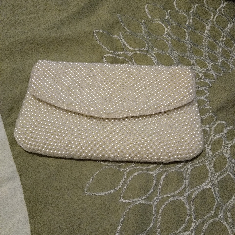 Beautiful pearl beaded clutch w/ strap